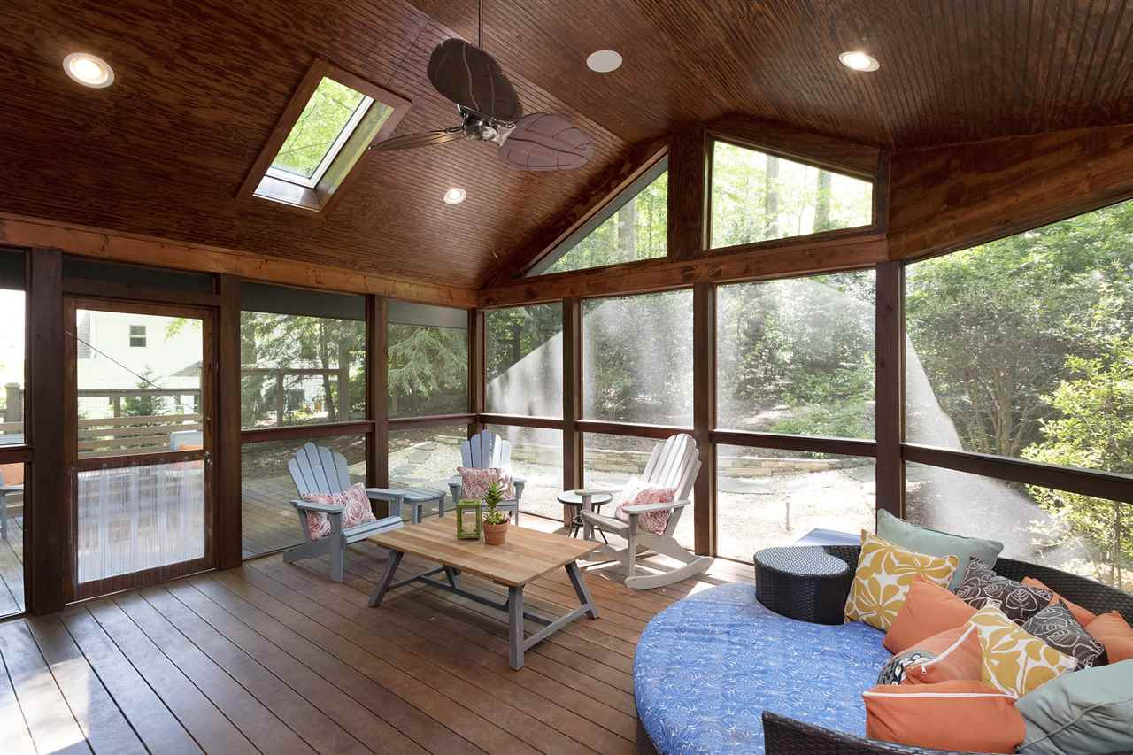 2908 Sandia Drive Raleigh, NC 27607 - Photo 12 of 29 Due to perfect SW exposure, you can plan to enjoy this huge screened in porch all year. Screened Porch