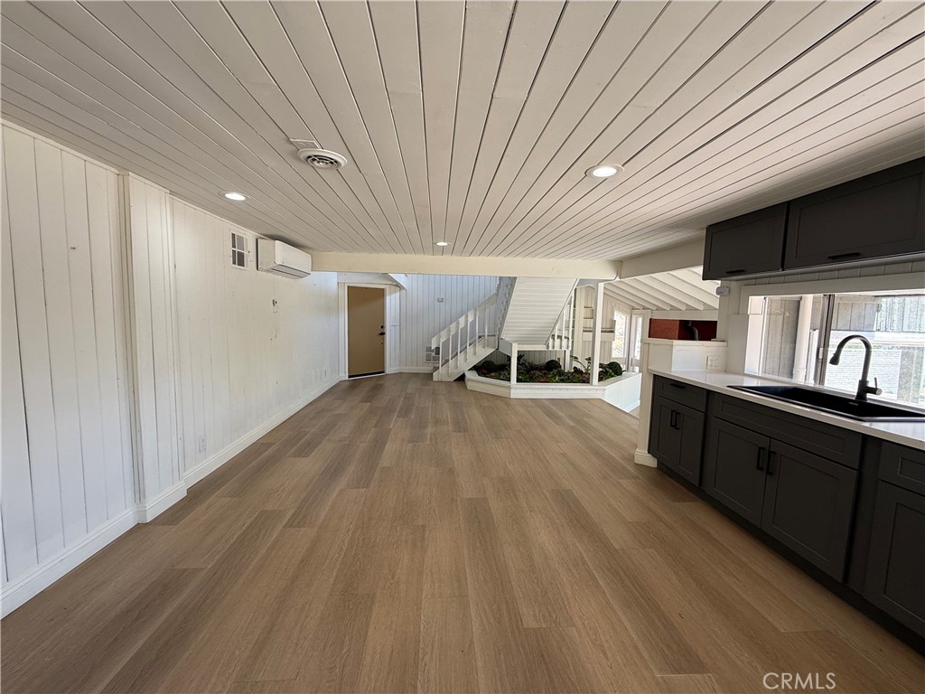 2390 Prenda Avenue Riverside, CA 92504 - Photo 15 of 41 a very nice looking room with wooden floor