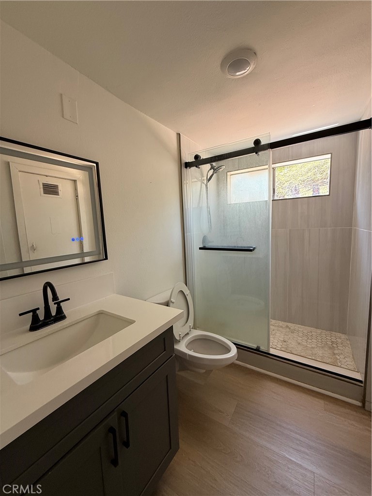 2390 Prenda Avenue Riverside, CA 92504 - Photo 27 of 41 a bathroom with a sink and a mirror