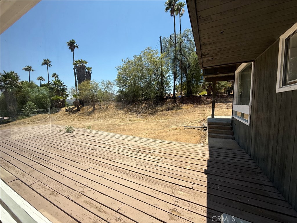 2390 Prenda Avenue Riverside, CA 92504 - Photo 31 of 41 a view of a terrace with wooden floor and outdoor space