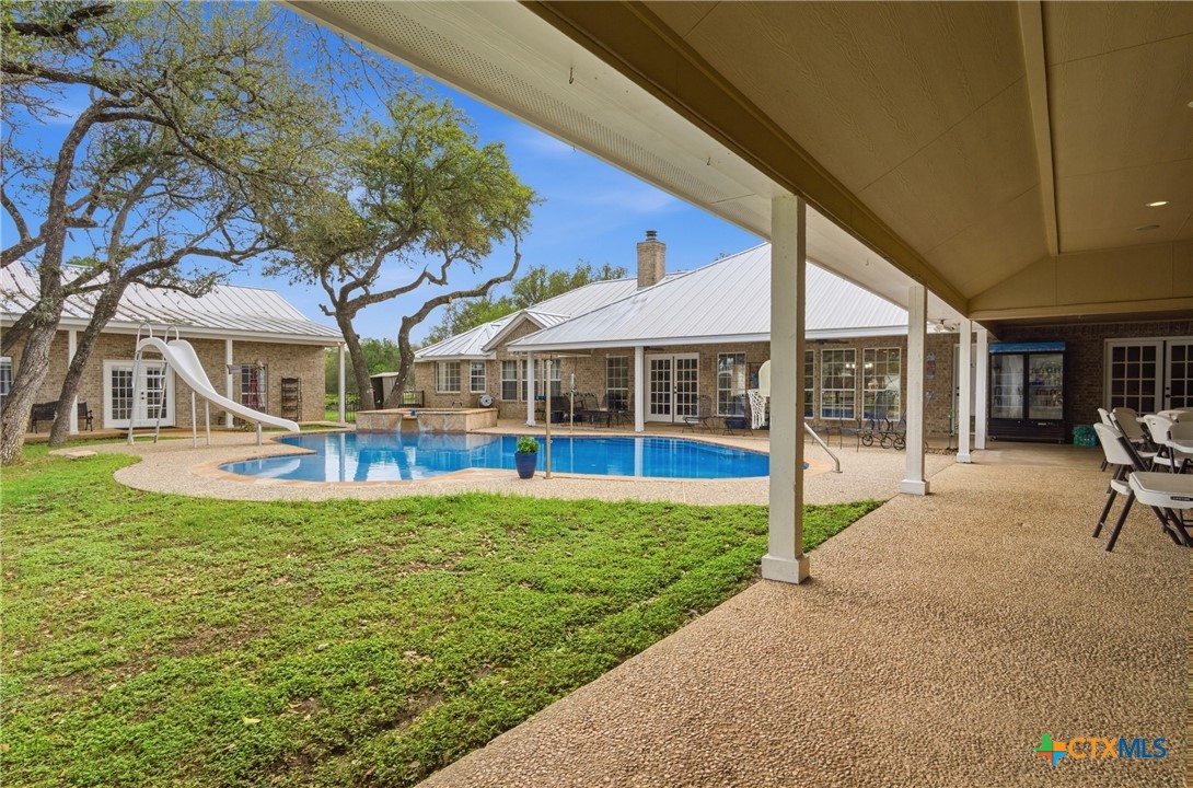 642 Phantom Rider Trail Spring Branch, TX 78070 - Photo 24 of 41 a view of a house with a yard