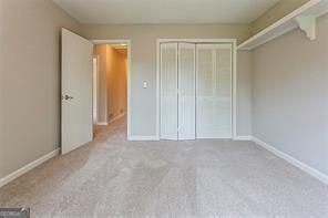 4722 Kenneth Drive Southwest Lilburn, GA 30047 - Photo 10 of 12 a view of an empty room