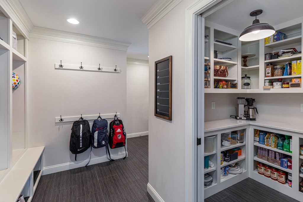 23 Pennock Road Ashland, MA 01721 - Photo 19 of 41 a view of a workspace with bookshelf and a workspace