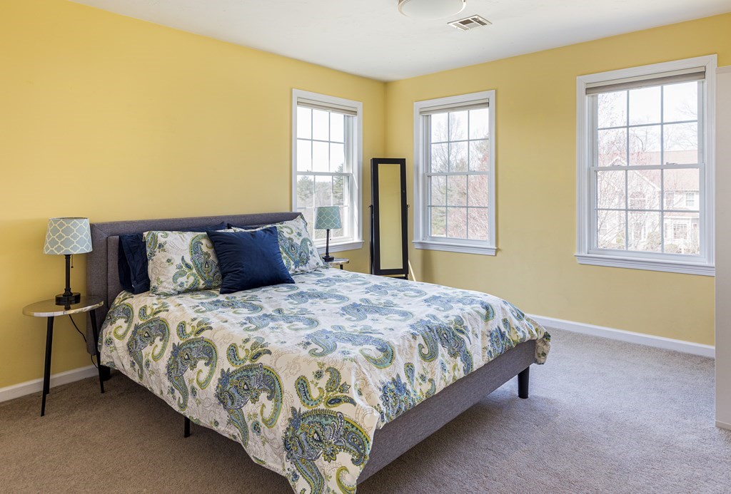 23 Pennock Road Ashland, MA 01721 - Photo 23 of 41 a bedroom with a bed and window