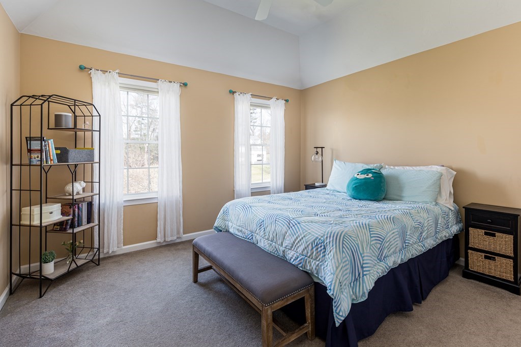 23 Pennock Road Ashland, MA 01721 - Photo 25 of 41 a bedroom with a bed and a cabinets