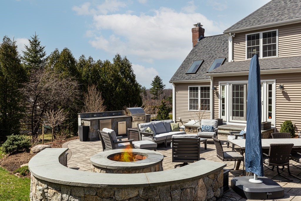 23 Pennock Road Ashland, MA 01721 - Photo 37 of 41 a view of a house with backyard kitchen and sitting area