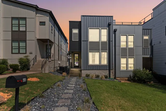 a house view with a garden space