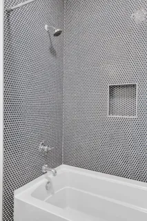 a bathroom with a bathtub