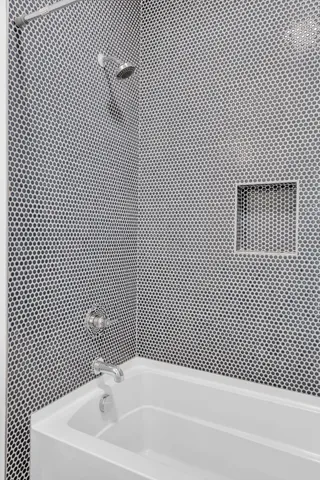 a bathroom with a bathtub