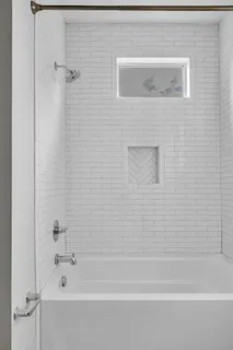 a bathroom with a bathtub