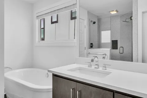 a bathroom with a sink and a bathtub