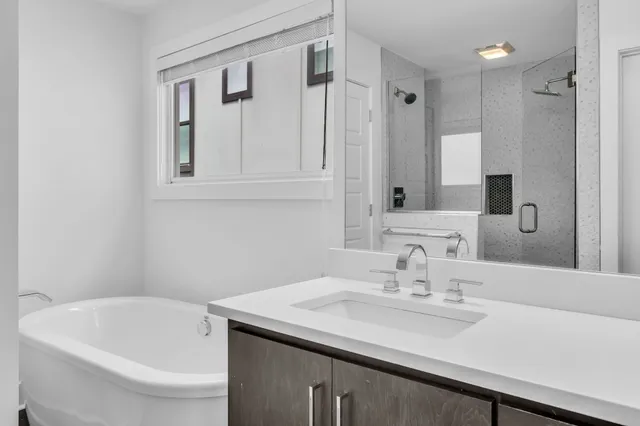 a bathroom with a sink and a bathtub