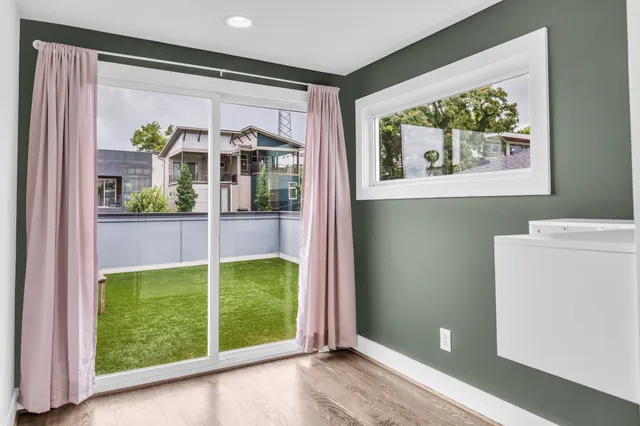 wooden floor in a room with a window