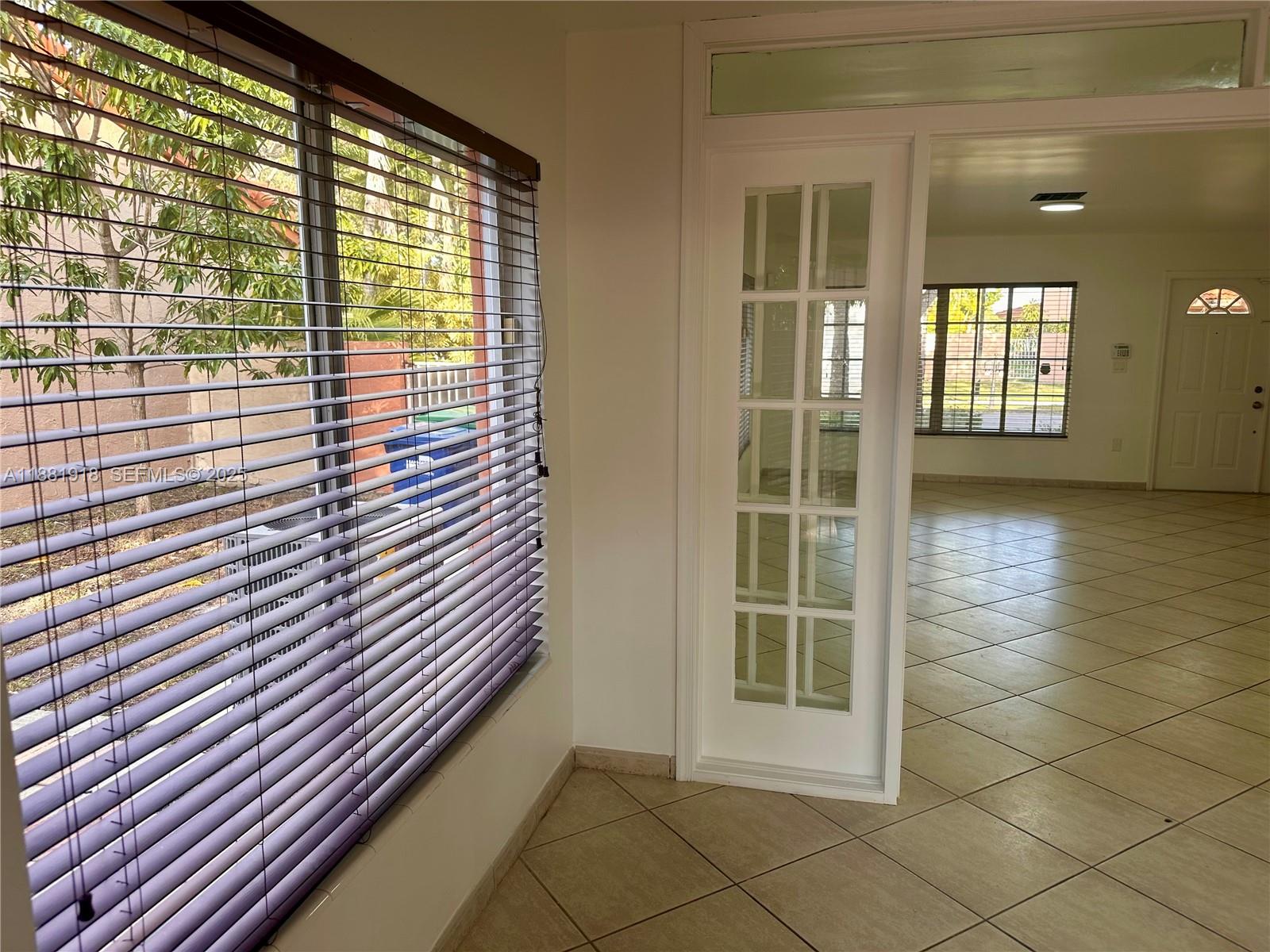 8950 Northwest 189th Terrace Hialeah, FL 33018 - Photo 11 of 42 a view of a porch