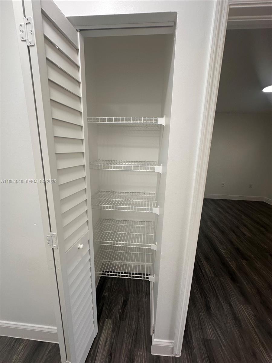 8950 Northwest 189th Terrace Hialeah, FL 33018 - Photo 21 of 42 a view of walk in closet