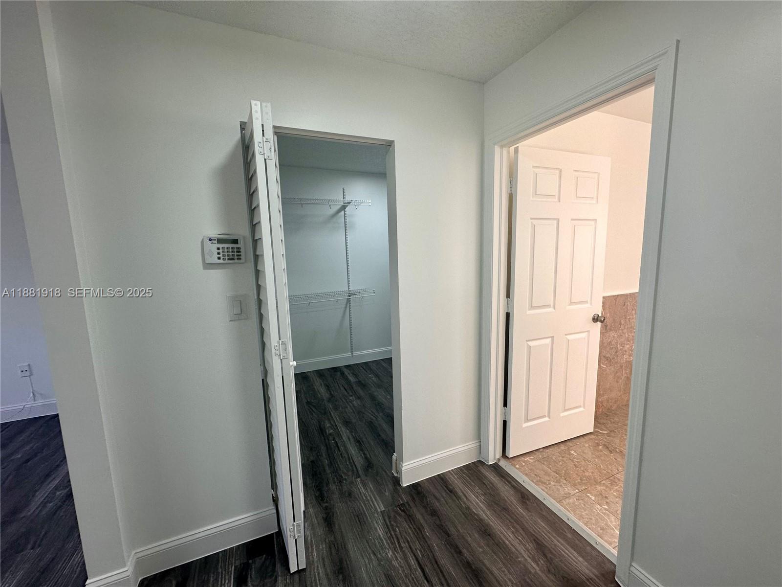 8950 Northwest 189th Terrace Hialeah, FL 33018 - Photo 36 of 42 a view of front door with wooden floor