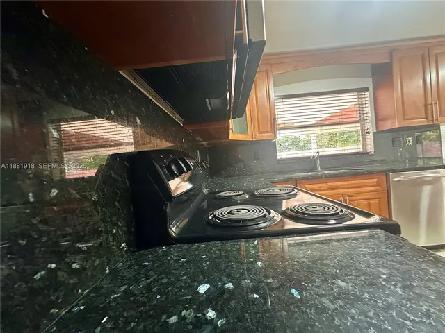 a view of a livingroom with furniture and window