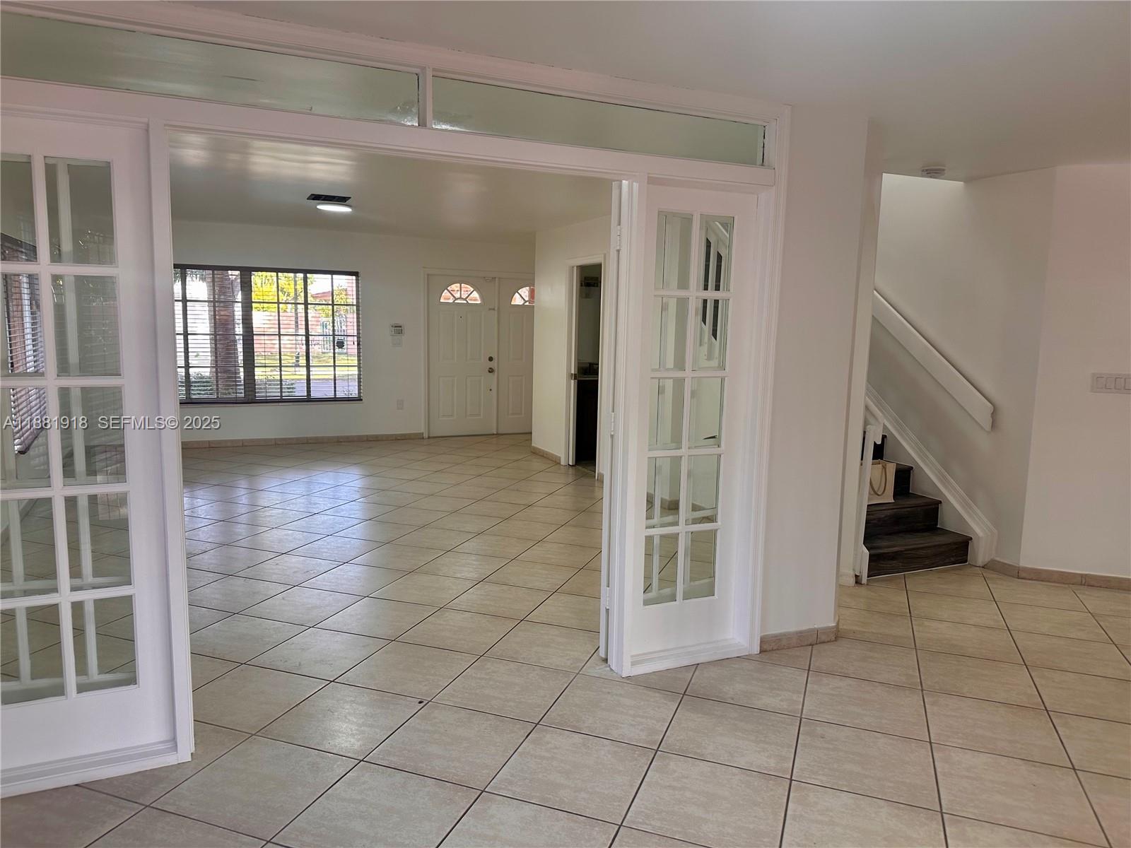8950 Northwest 189th Terrace Hialeah, FL 33018 - Photo 10 of 42 a view of entryway with a front door