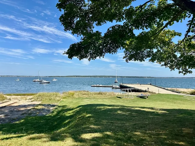 a view of a swimming pool with an outdoor space and seating area