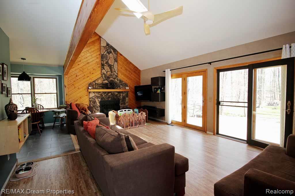 5276 Green Road Fenton, MI 48430 - Photo 5 of 23 Gas Fireplace, skylights and windows galore!