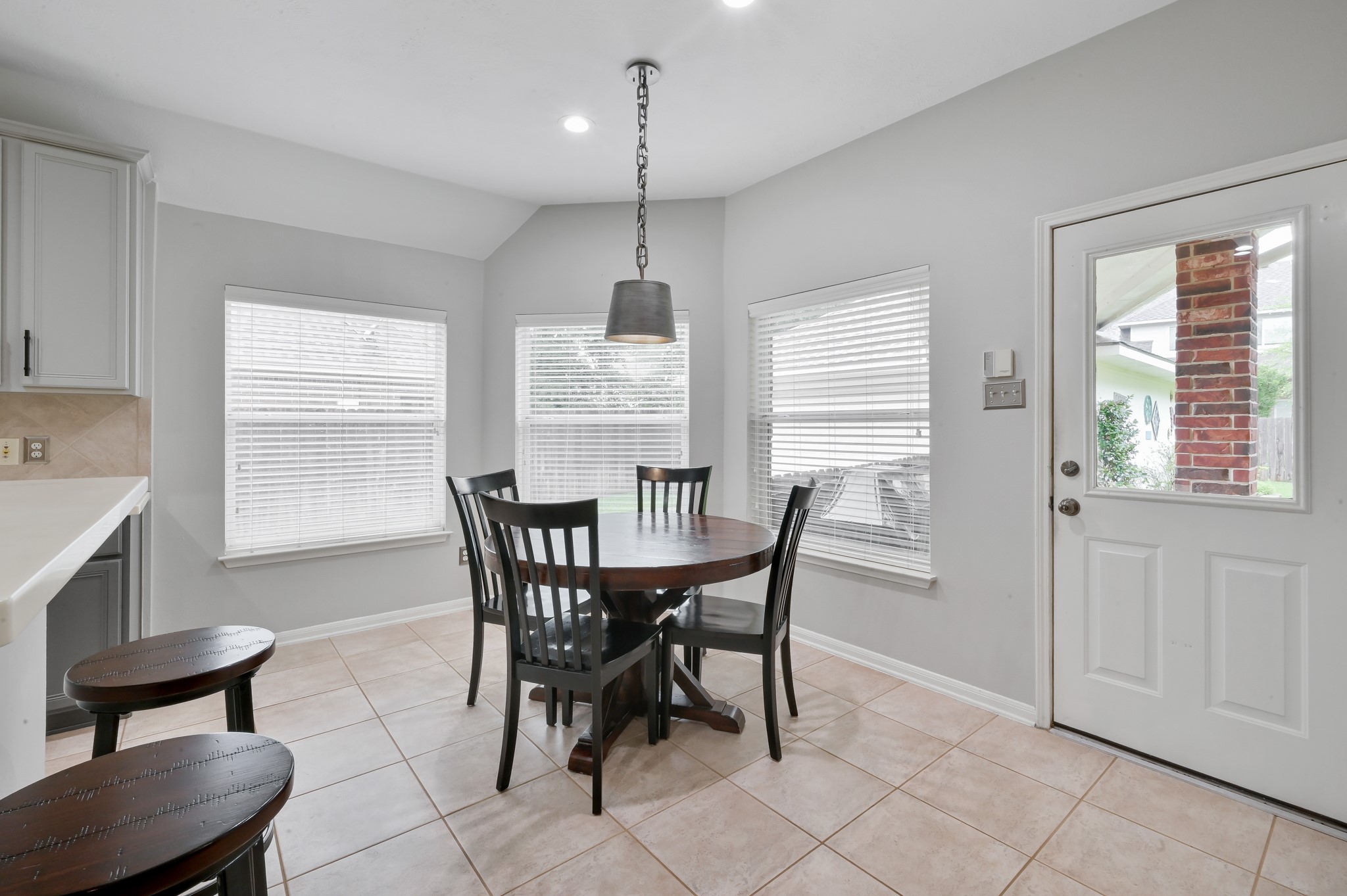 2 Westward Ridge Place The Woodlands, TX 77384 - Photo 19 of 43 The breakfast room seamlessly opens up from both the kitchen and the living room with easy access to the porch