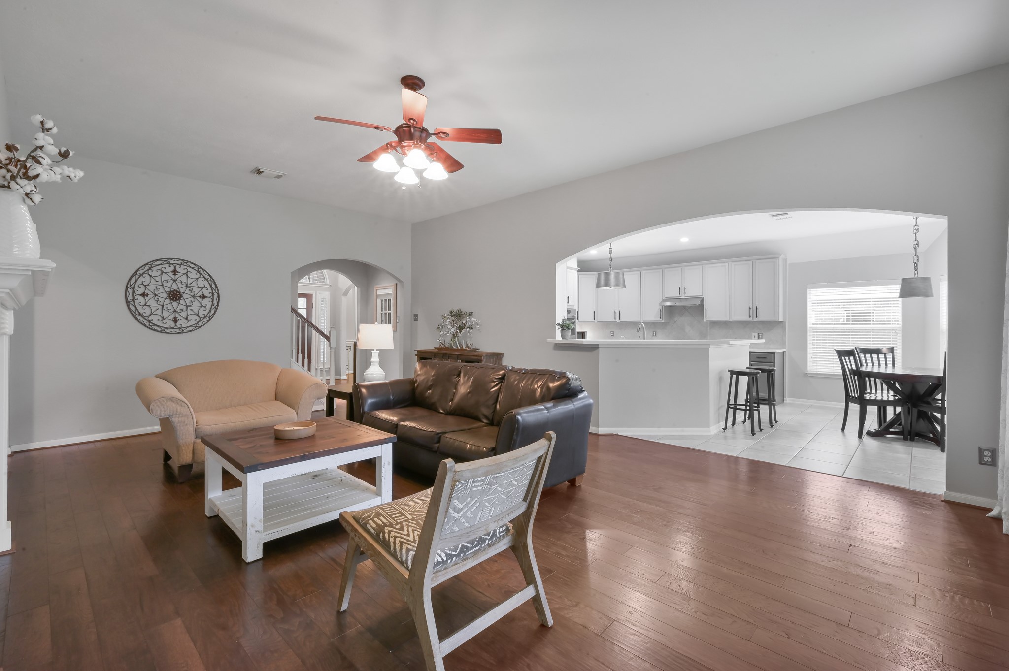 2 Westward Ridge Place The Woodlands, TX 77384 - Photo 22 of 43 The living room leads right into the kitchen
