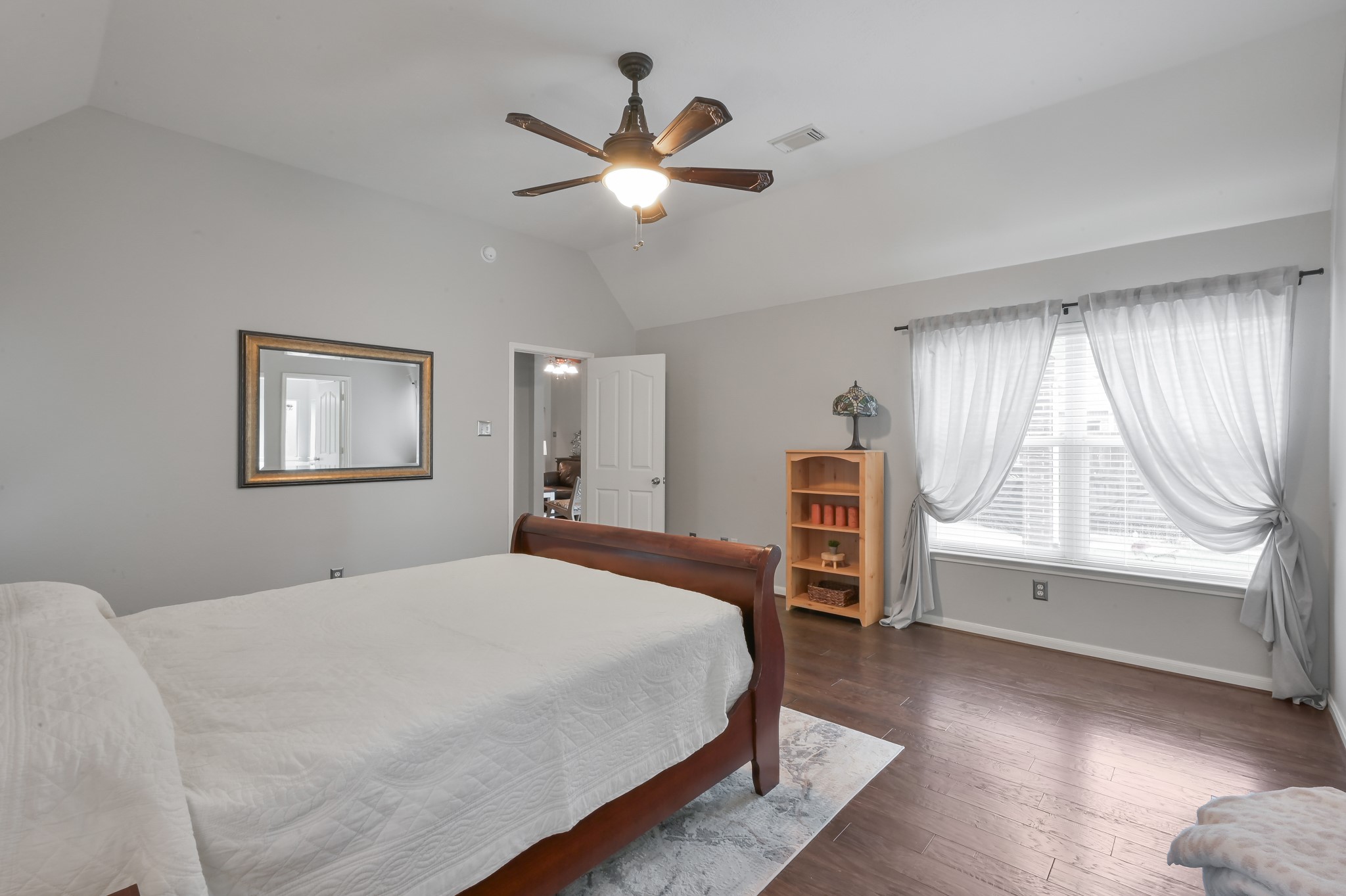 2 Westward Ridge Place The Woodlands, TX 77384 - Photo 24 of 43 Primary bedroom flows from the living room