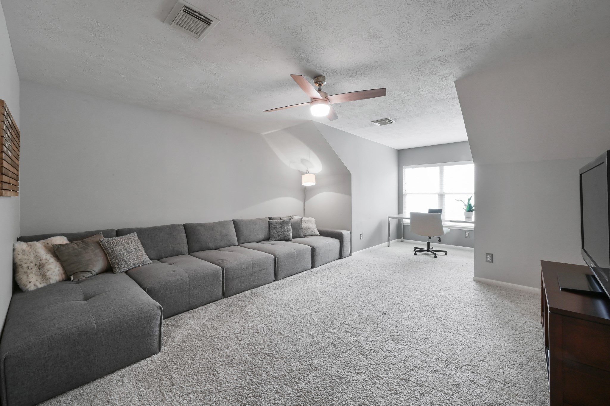 2 Westward Ridge Place The Woodlands, TX 77384 - Photo 33 of 43 This versatile and inviting area is perfect for hosting guests or watching a move on the big screen. It is pre-wired and pre-mounted for large LCD TV