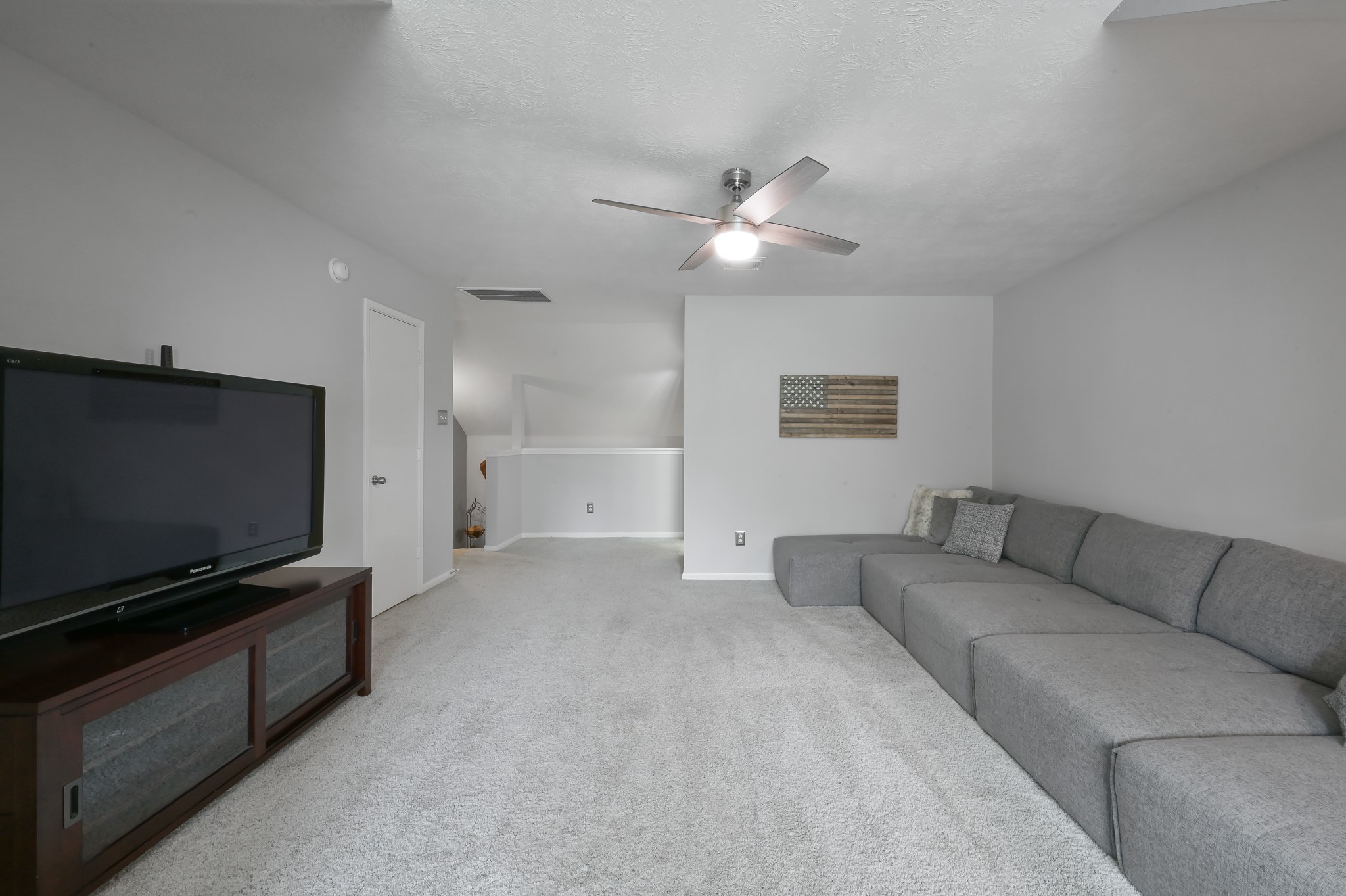 2 Westward Ridge Place The Woodlands, TX 77384 - Photo 34 of 43 Game/guest area offers added walk-in storage closet and multiple walk-in access to the attic