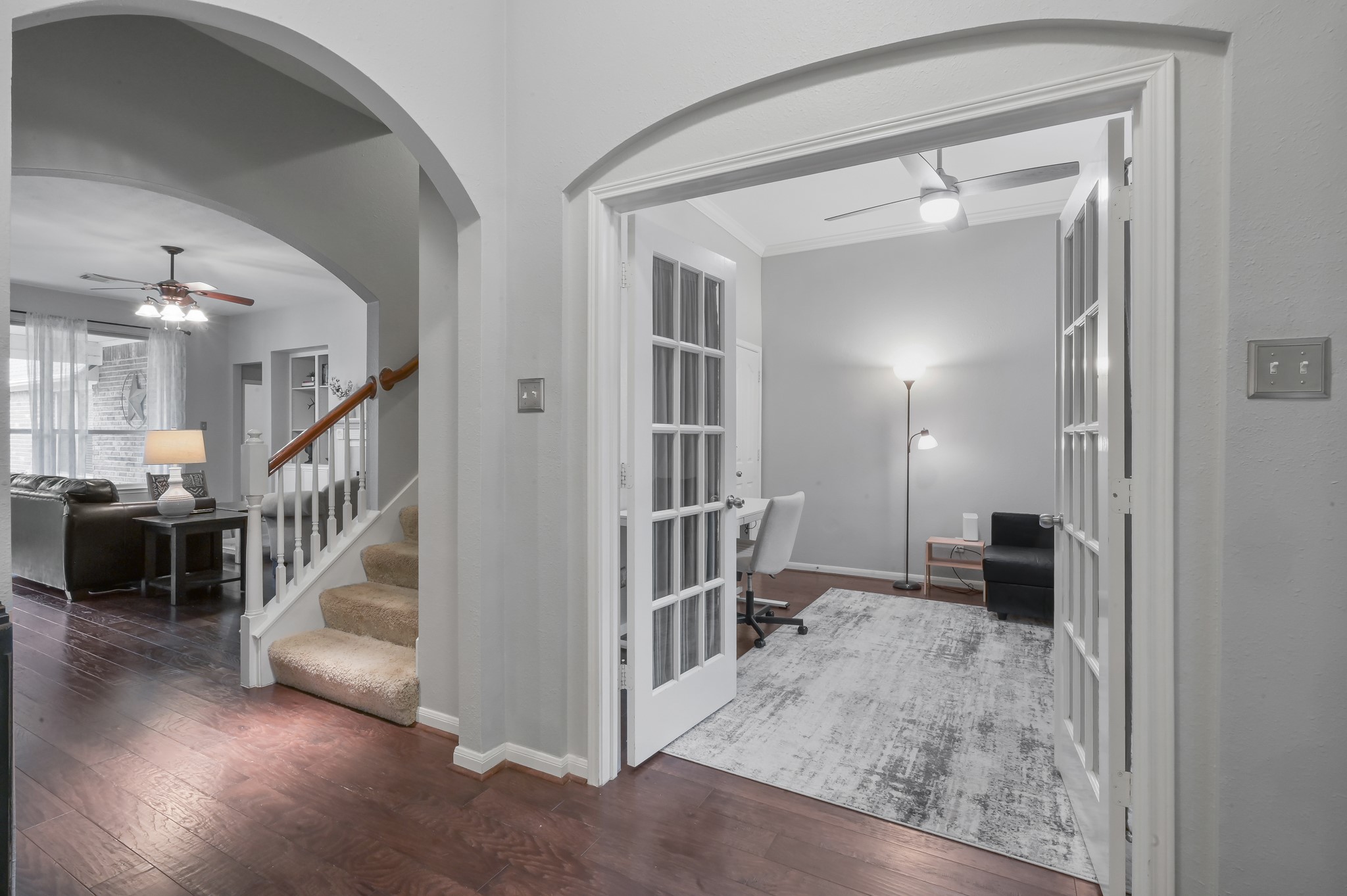2 Westward Ridge Place The Woodlands, TX 77384 - Photo 7 of 43 Entryway reveals the interior with hardwood floors and fresh Sherwin Williams paint throughtout