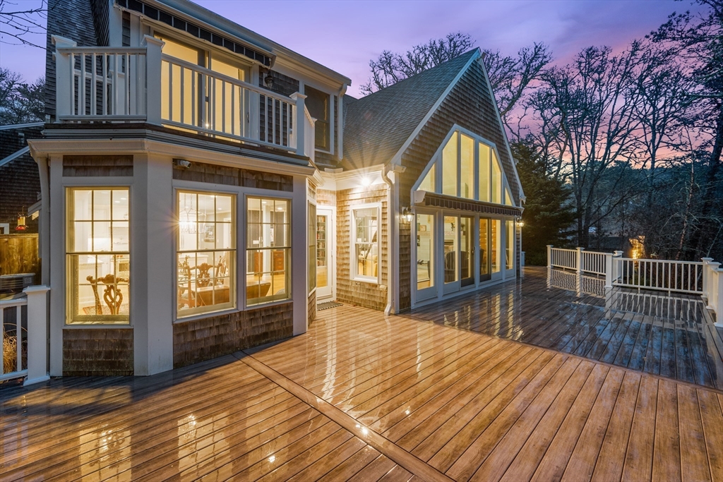 a view of living room and wooden floor