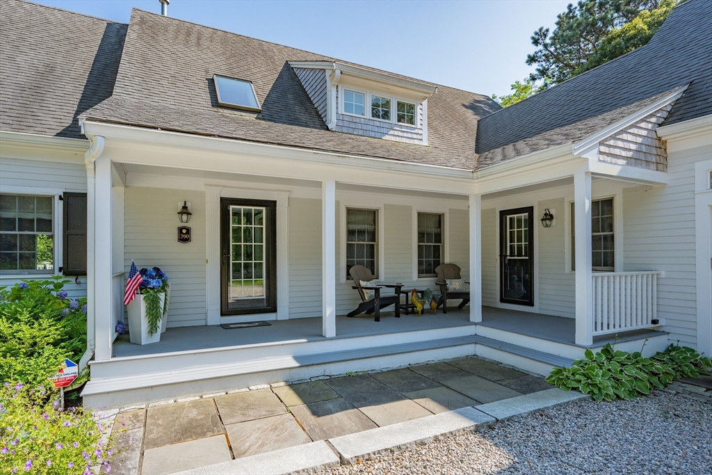 290 Old Comers Road Chatham, MA 02633 - Photo 3 of 40 a view of a house with outdoor seating space