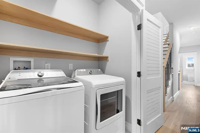 a utility room with dryer and washer