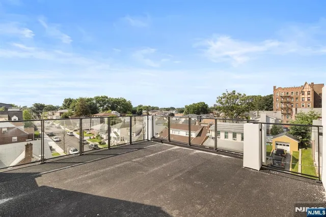 a view of a terrace with city view