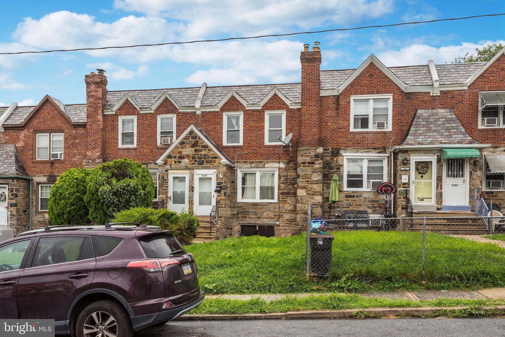 7249 Spruce Street Upper Darby, PA 19082 - Photo 2 of 30 a front view of a house with a yard