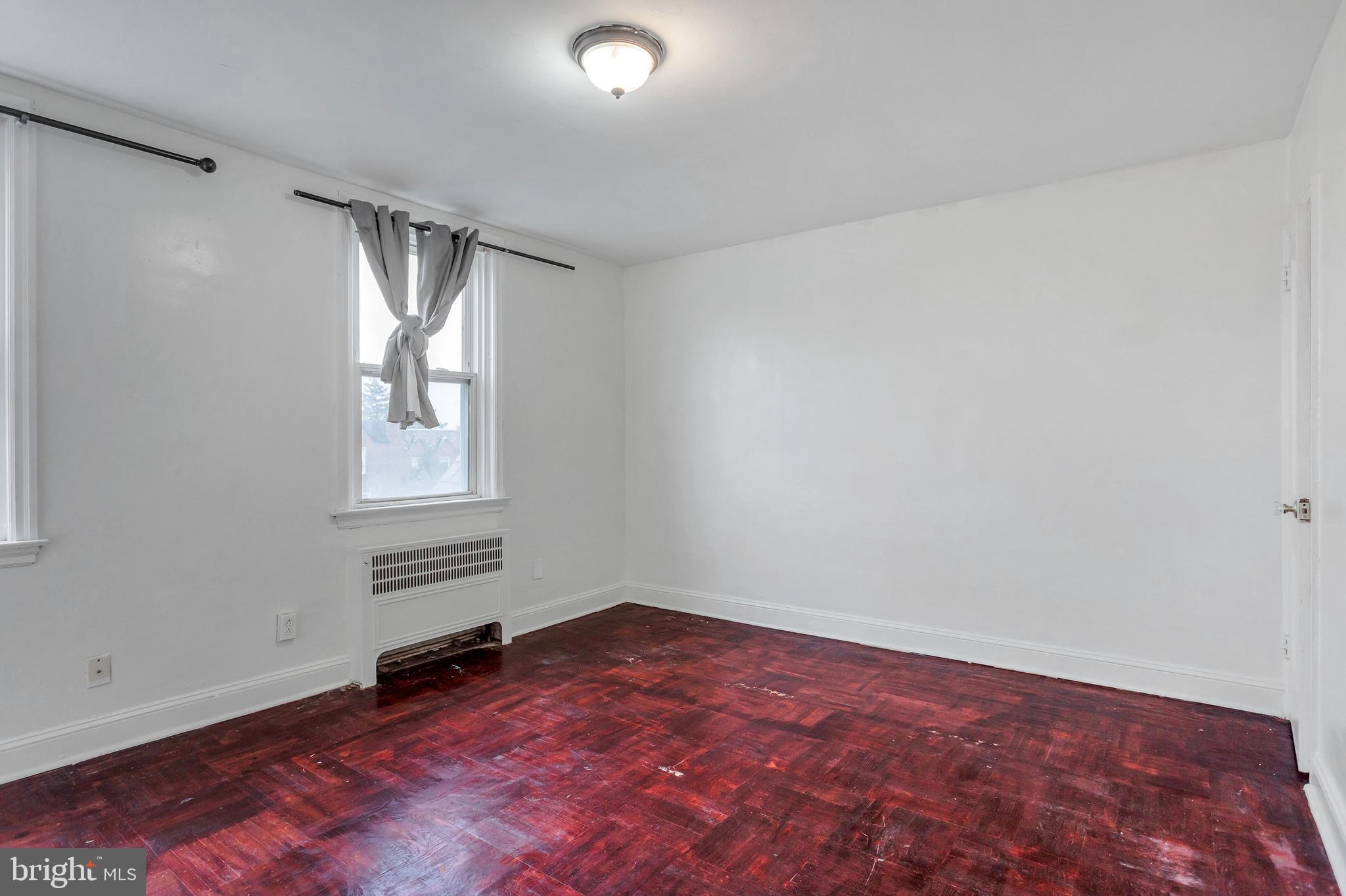 7249 Spruce Street Upper Darby, PA 19082 - Photo 21 of 30 an empty room with windows