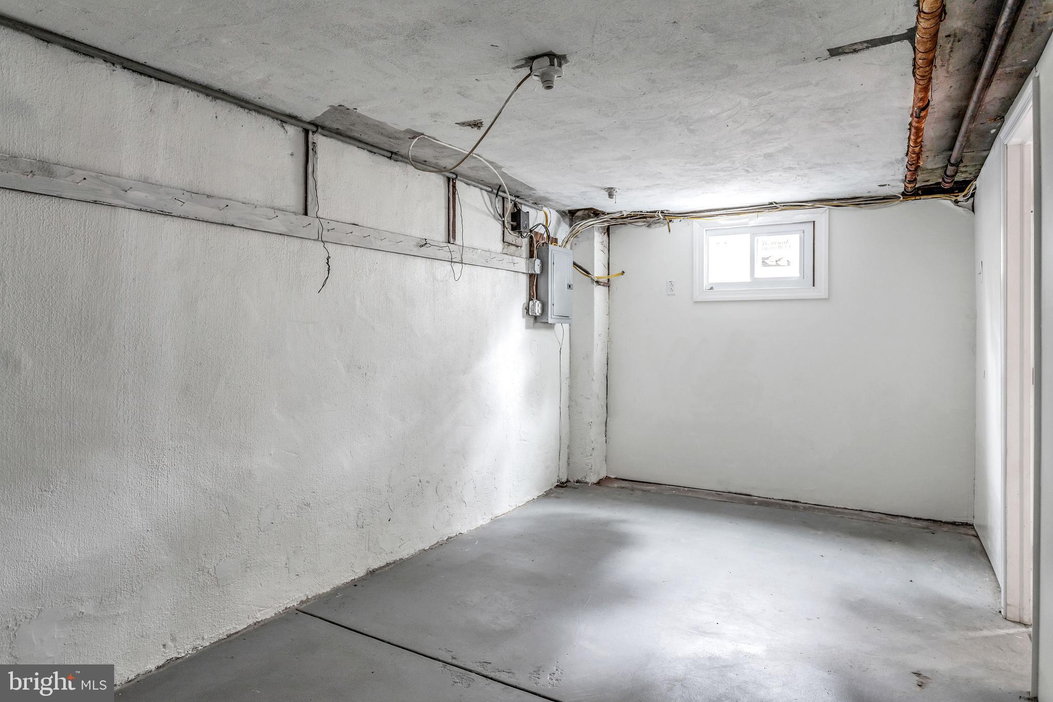 7249 Spruce Street Upper Darby, PA 19082 - Photo 24 of 30 a view of a room with racks on the wall