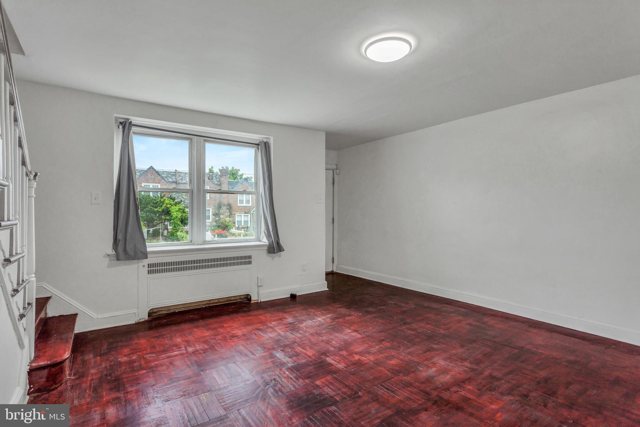 7249 Spruce Street Upper Darby, PA 19082 - Photo 5 of 30 an empty room with windows
