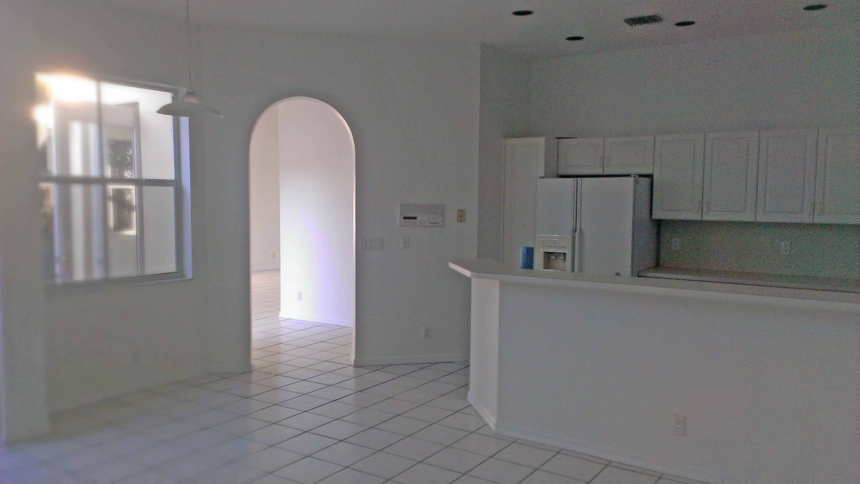 17132 Bermuda Village Drive Boca Raton, FL 33487 - Photo 3 of 11 KITCHEN ENTRANCE