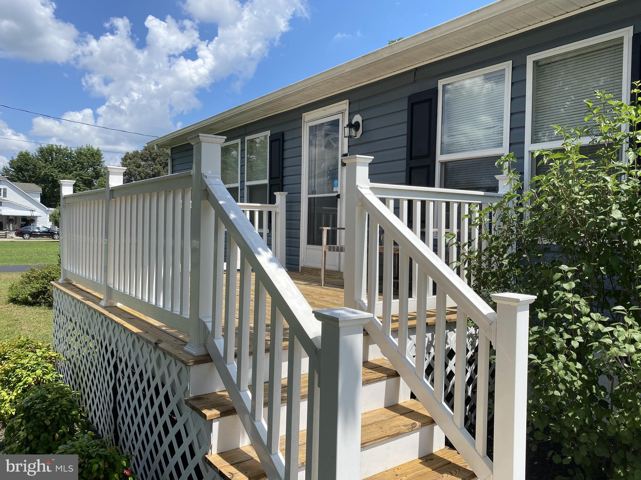 1336 Killens Pond Road Harrington, DE 19952 - Photo 3 of 29 Front deck faces the sunsets!
