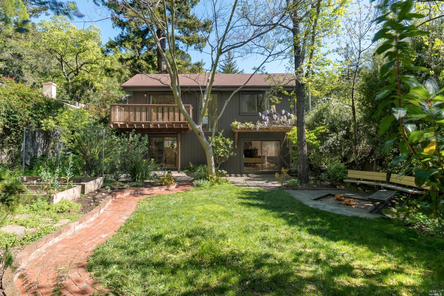 7 Valley Road Fairfax, CA 94930 - Photo 1 of 1 a front view of a house with a garden
