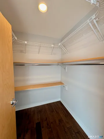 a view of an empty walk in closet
