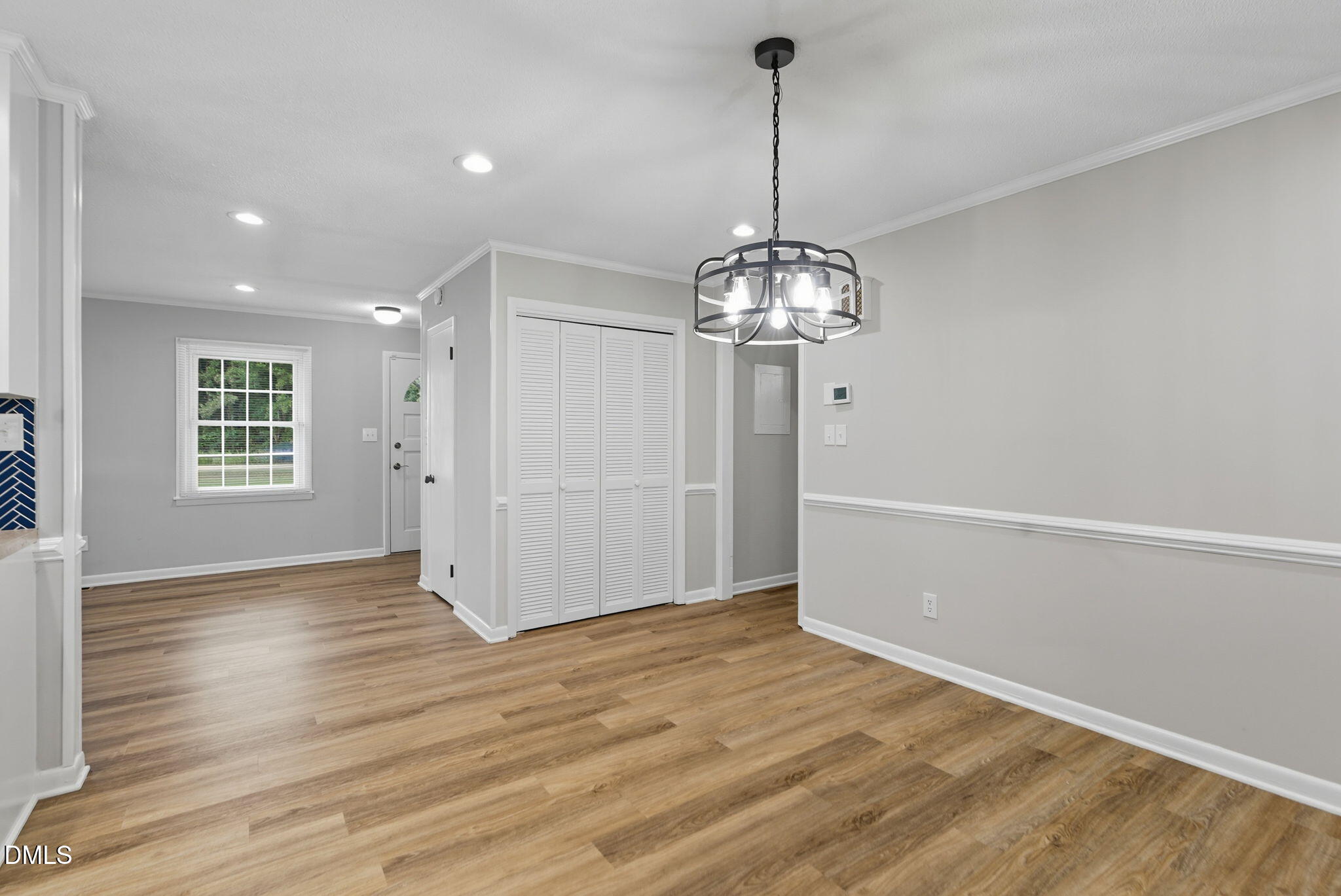 2238 Tarboro Road Youngsville, NC 27596 - Photo 19 of 41 a view of empty room with wooden floor and window