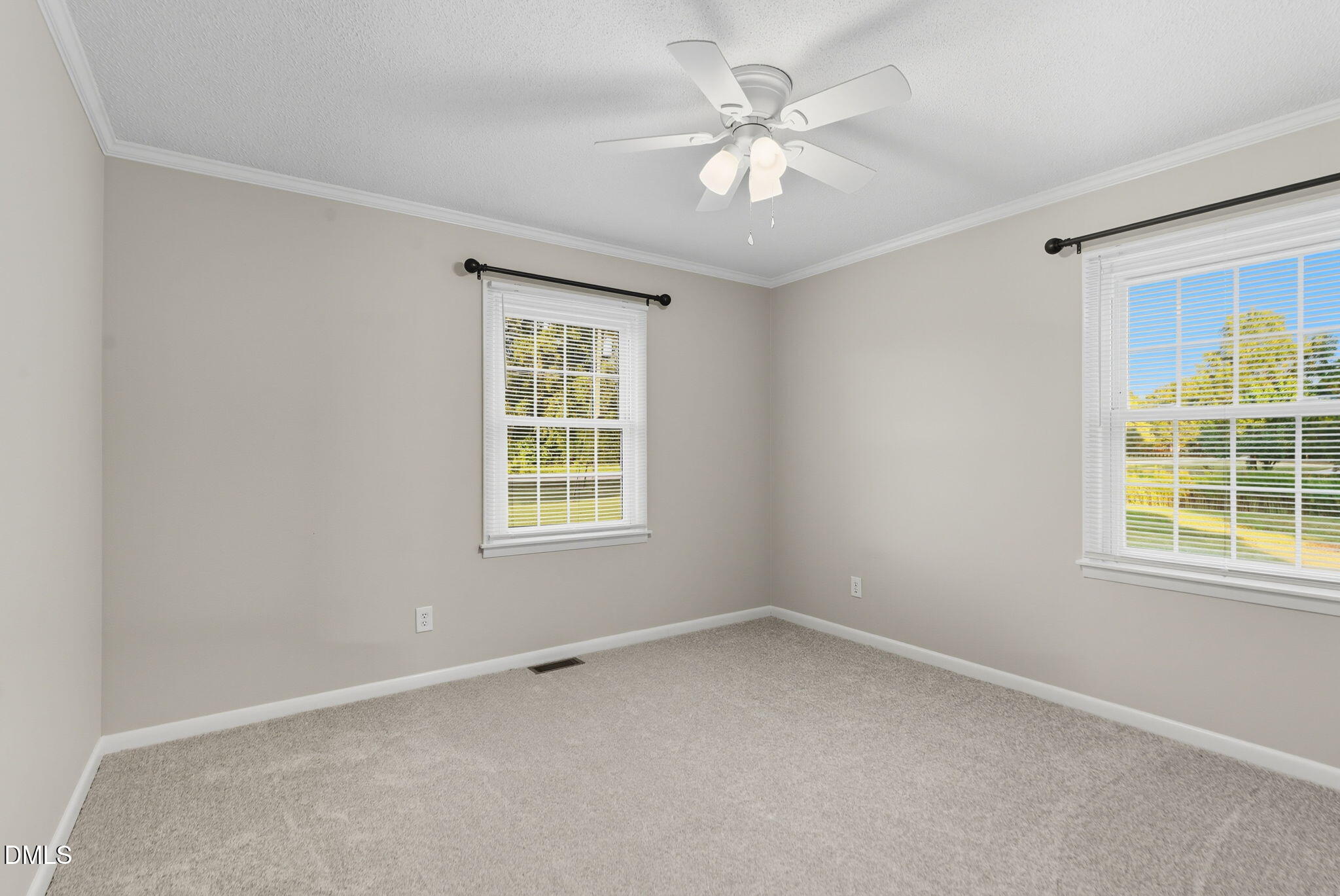 2238 Tarboro Road Youngsville, NC 27596 - Photo 31 of 41 an empty room with a window