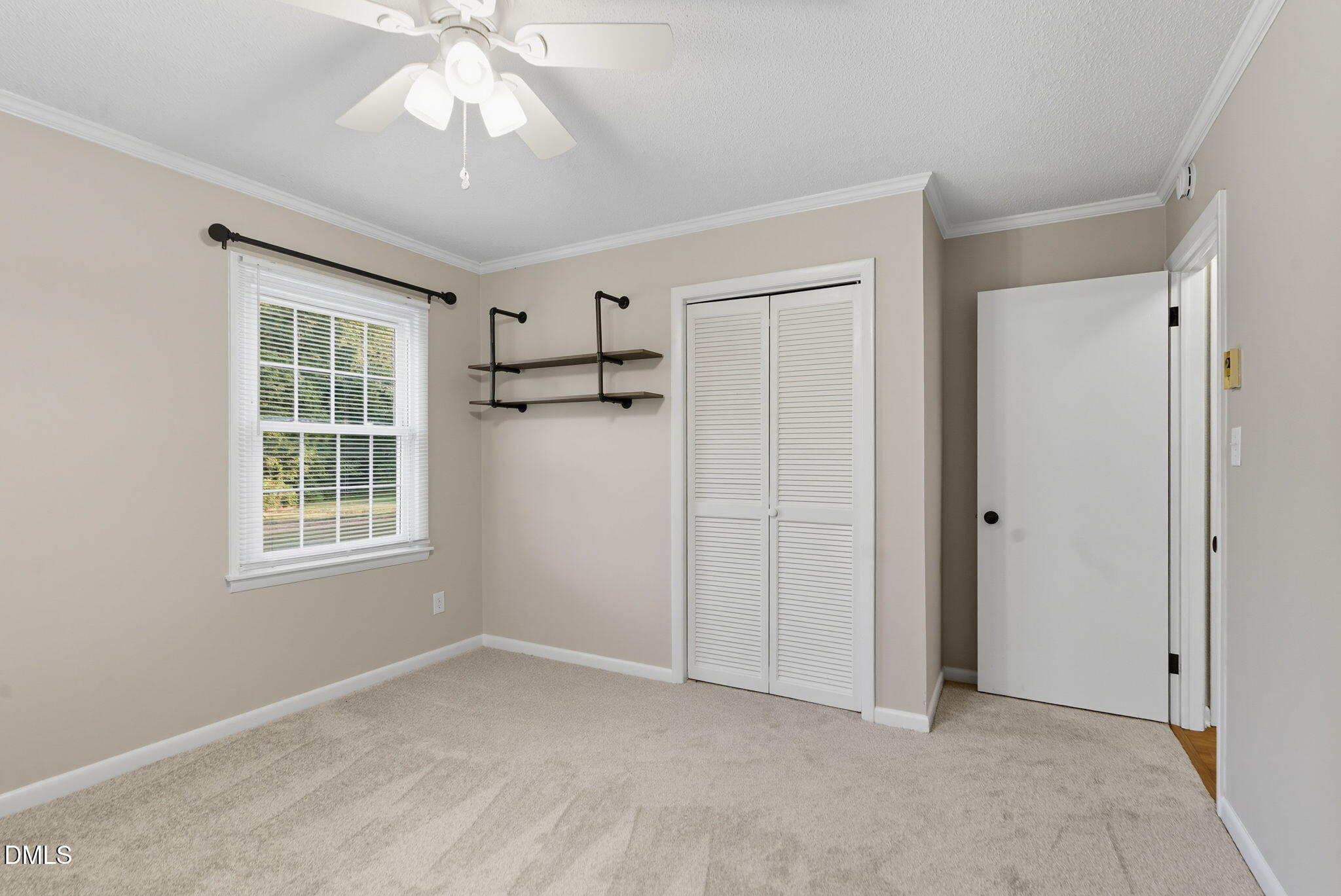 2238 Tarboro Road Youngsville, NC 27596 - Photo 32 of 41 a view of an empty room with a window
