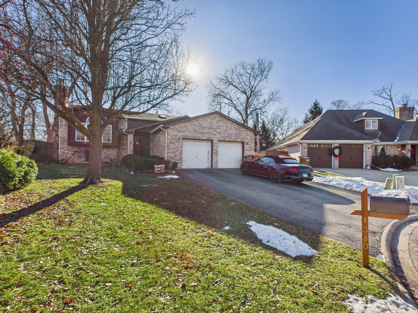 1380 Oak Ridge Court Willow Springs, IL 60480 - Photo 4 of 7 a front view of a house with a yard