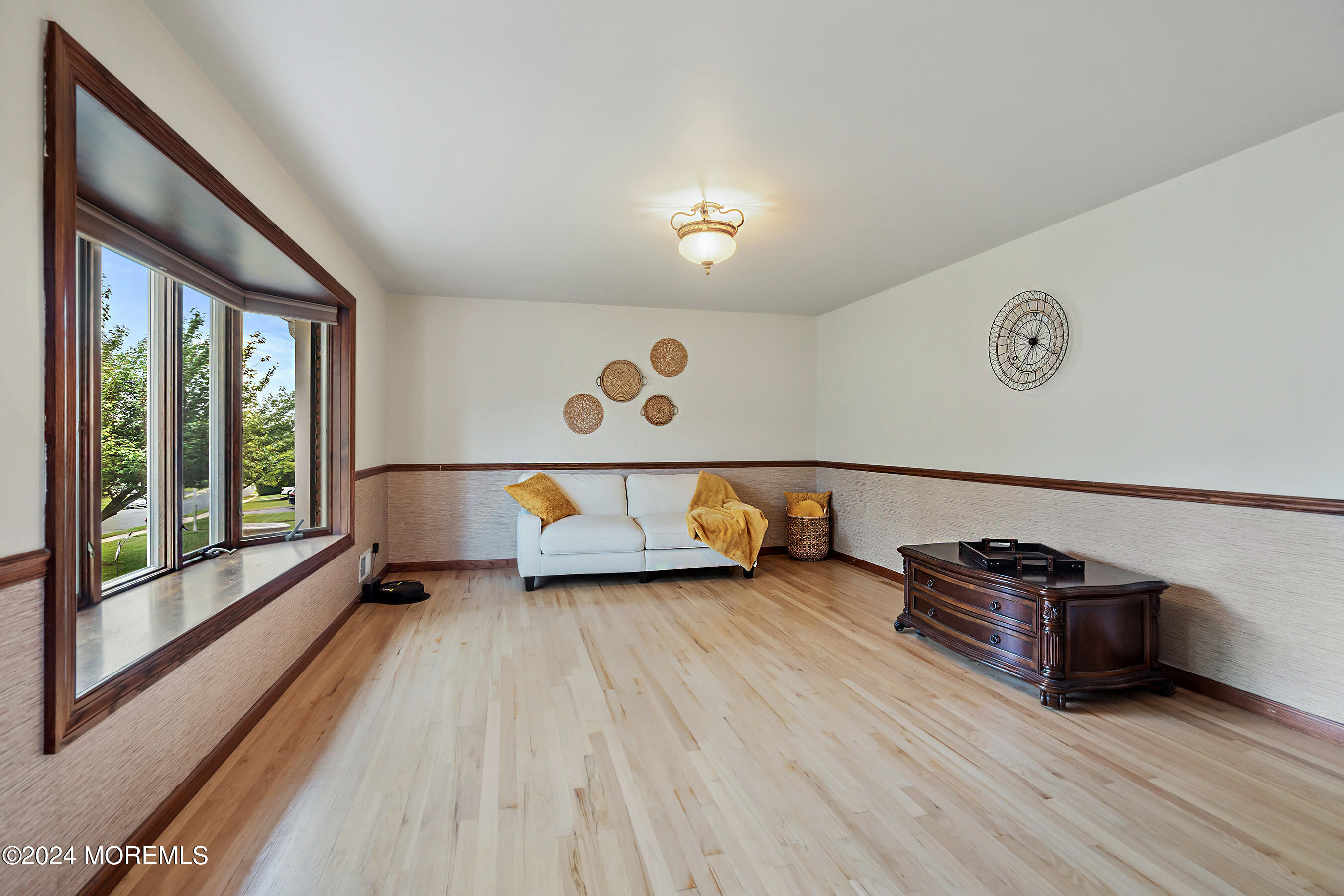 59 Westbrook Road Howell, NJ 07731 - Photo 8 of 35 a view of a room with furniture wooden floor and window