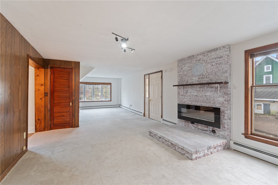 21 Maple Street Lyons, NY 14489 - Photo 14 of 37 Another view of the LIVING ROOM with a brick heart