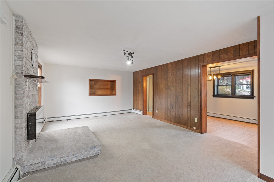 21 Maple Street Lyons, NY 14489 - Photo 16 of 37 The OPEN SPACE in the living room can handle your