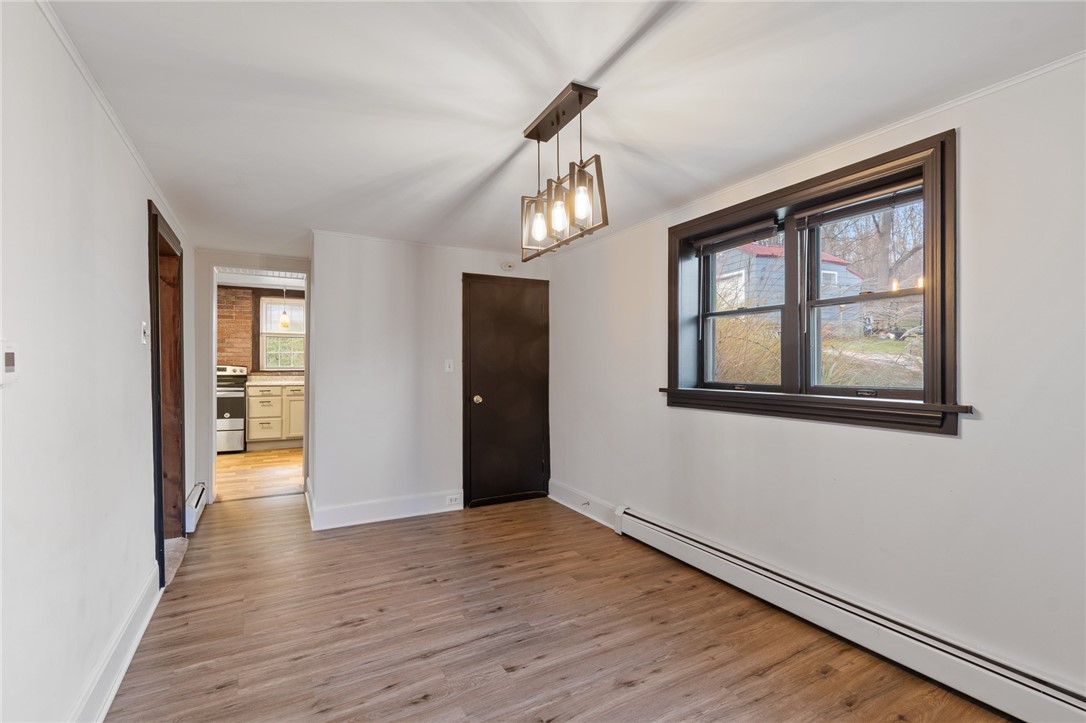 21 Maple Street Lyons, NY 14489 - Photo 17 of 37 The formal dining room to the kitchen